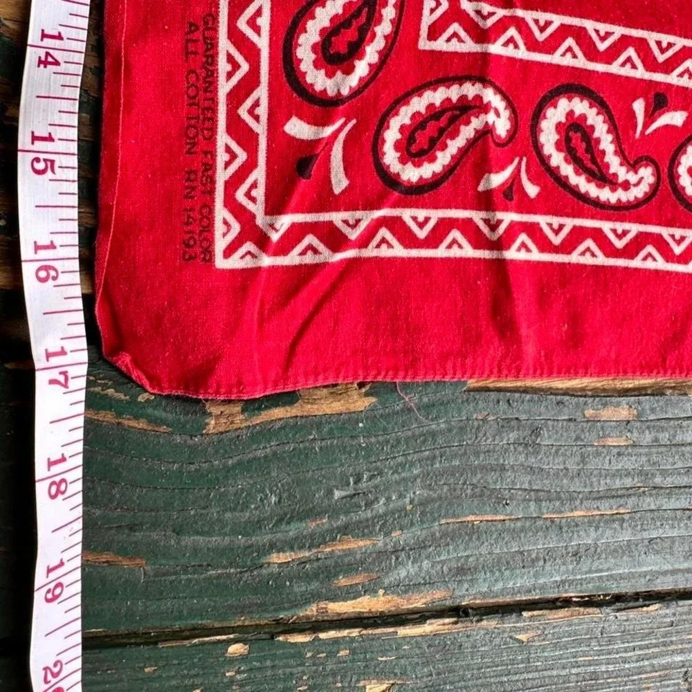 Red bandana scarf with‎ white paisley design